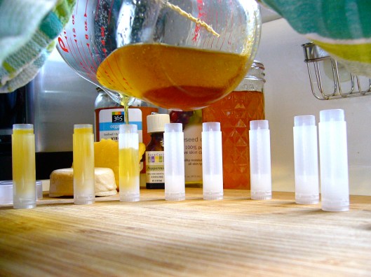 Photo of filling lip balm tubes with homemade peppermint lip balm Photo of filling lip balm tubes with homemade peppermint lip balm