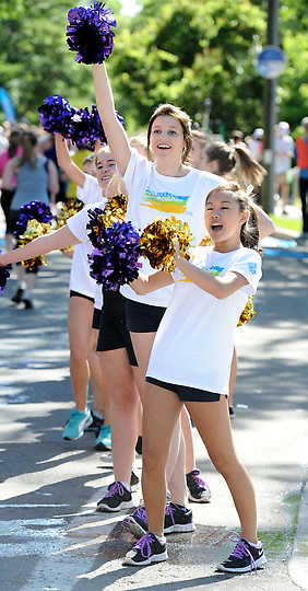 Girls cheering for The 2012 Bolder Boulder