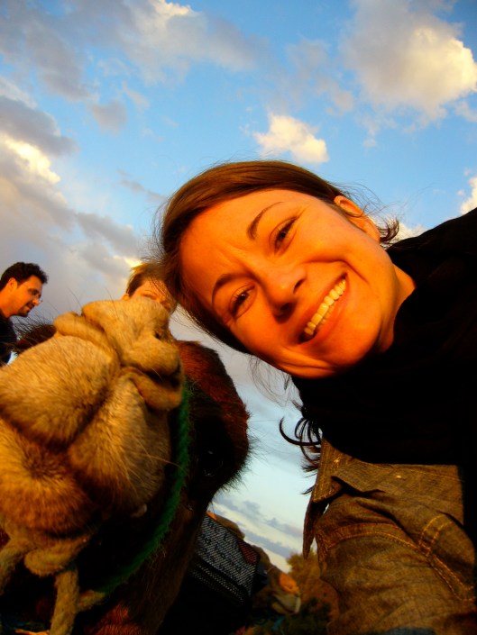 Spice Jones on a camel in the Sahara
